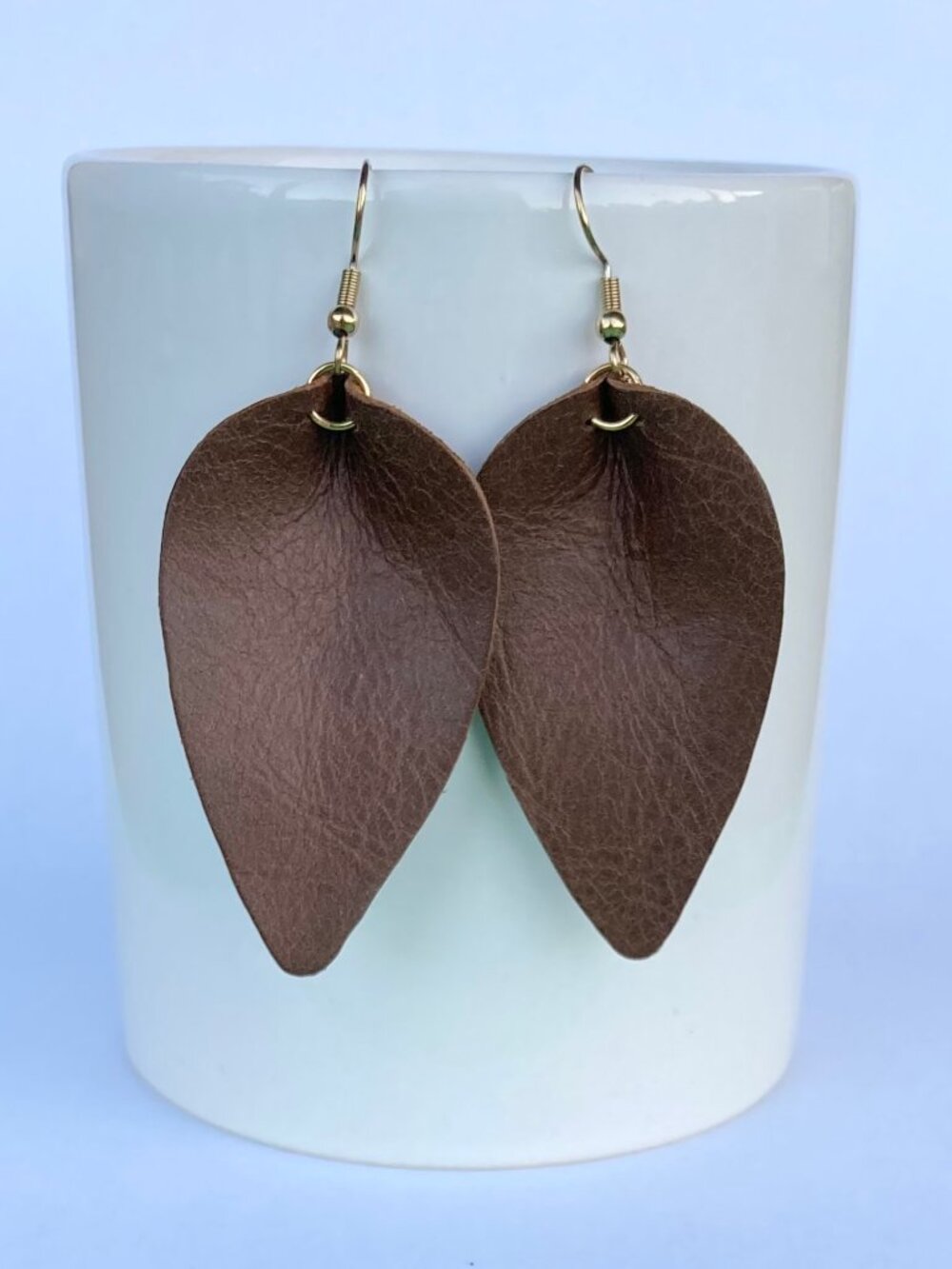 Handmade brown pinched leaf style earrings made from genuine Italian leather
